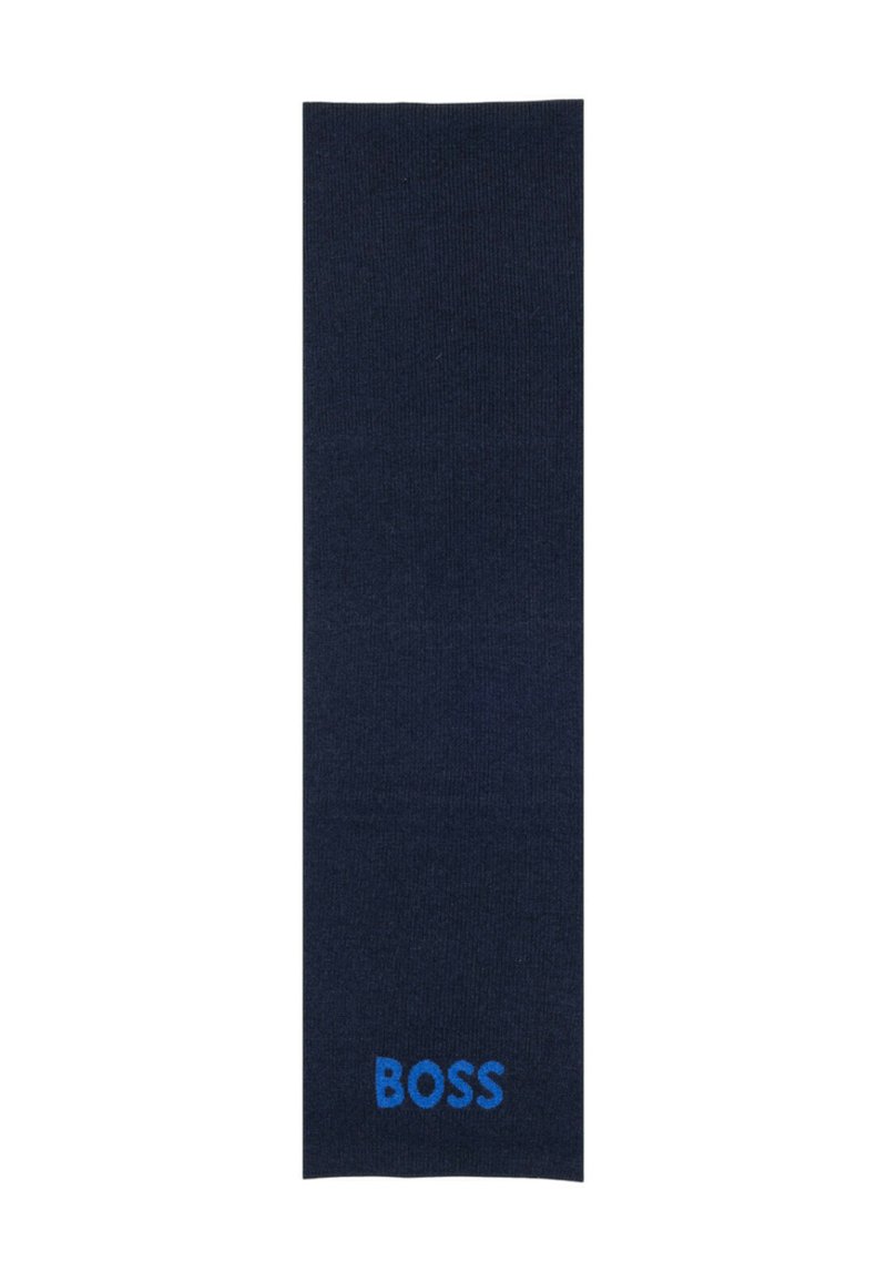 Tmavě modré ponožky s žebrovanou texturou a modrým logem "BOSS" poblíž spodní části. Klasický design vhodný pro každodenní i formální nošení.