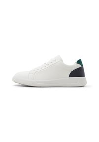 Sneakers bianchi in materiale canvas, forma arrotondata, lati testurizzati e accenti verde scuro e blu navy sul tallone. Chiusura con lacci.