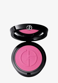 Rund svart kompakt med hengslet lokk, som inneholder en lys rosa rouge preget med en logo, med en glatt tekstur og matt finish.