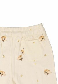 Krämfärgad pyjamasbyxor med elastisk midja, med ett mönster av rådjur och gula accenter. Sidoficka på höger bak. Mjuk tygtextur.