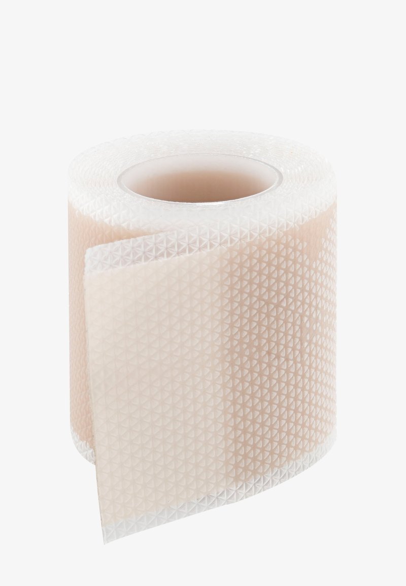 Rouleau adhésif de couleur pêche douce avec un motif triangulaire texturé, doté d'un support transparent et de bords lisses.