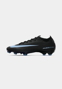Black soccer cleat with a textured upper, light blue Swoosh logo, and a blue sole. Features include a sleek, aerodynamic design and studded outsole.
