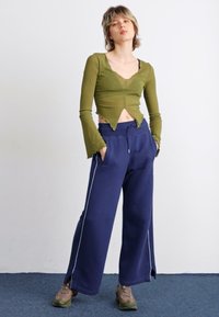 Nike Sportswear PANT - Teplákové kalhoty - ashen slate