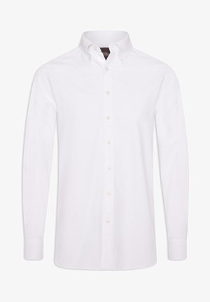 Vit långärmad skjorta med knappar, tillverkad av bomull med klassisk krage, med en rad knappar framtill och knappade ärmslut.