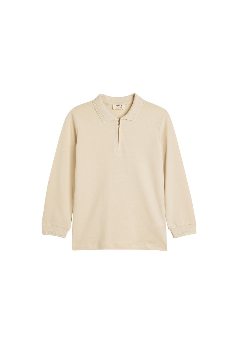 Beige polo shirt met lange mouwen en een halve rits kraag, geribbelde halslijn en manchetten, gemaakt van een zachte stof met een gladde textuur.