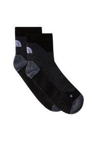 Czarno-szare skarpetki z wypukłą teksturą, wzmocnionym palcem i piętą, oraz wzorzystym akcentem blisko góry.