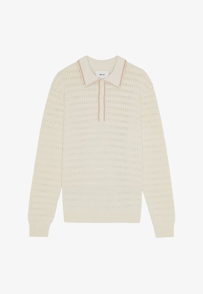 Knit pullover vaaleassa sävyssä, jossa on teksturoitu kuvio, ribbauskaulus ja hihansuut sekä lyhyt vetoketjukiinnitys, jossa on monivärisiä ompeluyksityiskohtia.