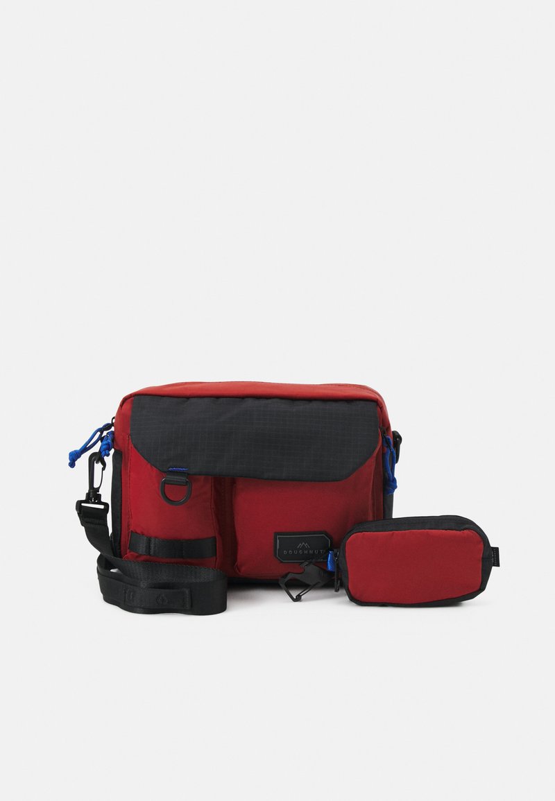 Doughnut MISSION UNISEX Across body bag blood orange/orange