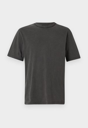 Tumehall lühikeste varrukatega T-särk ümarate kaelustega, pehmest puuvillakangast, mille servadel on peened õmblused.