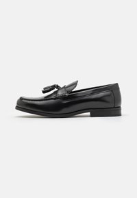 Atlasīts, black