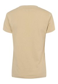 Krátké béžové bavlněné tričko s kulatým výstřihem a hladkou texturou; má čistý, přímý design bez vzorů.