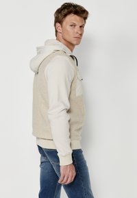 Koroshi Jachetă din fleece - beige