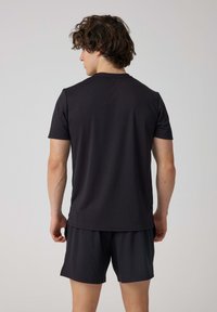SNOCKS T-shirt basic - schwarz