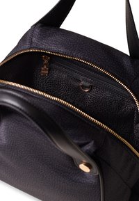 Black leather handbag with textured pattern, top zipper closure, and gold-tone hardware. Interior features a zip pocket and keychain loop.