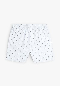 Calzoncillos a rayas blancas con un patrón repetido de calaveras y huesos cruzados en negro, con una cinturilla elástica para un ajuste cómodo.