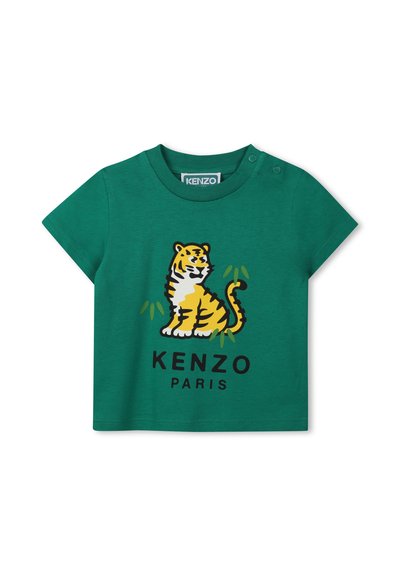 Groene katoenen t-shirt met een gele en zwarte tijgerafbeelding, de tekst "KENZO" en "PARIJS", en drukknoopjes op een schouder.