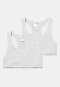 Ensemble bralette en coton blanc avec une texture côtelée, doté de larges bretelles, d'un col rond et d'une finition argentée à l' ourlet. Deux pièces incluses.