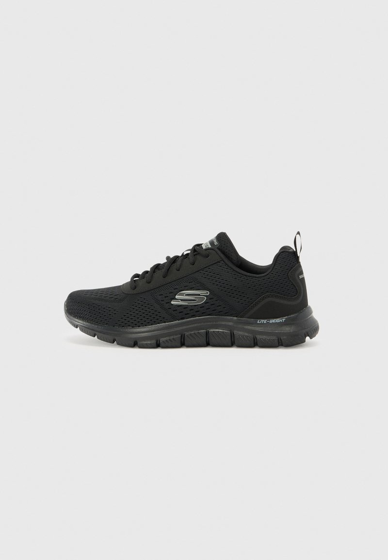 Black athletic shoe with mesh upper, lace-up design, cushioned sole, and textured tread. Features subtle branding on the side and heel.