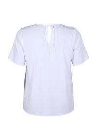 Blusa bianca con maniche corte, scollo rotondo e apertura a chiave sul retro, con chiusura legata. Tessuto liscio e leggero.