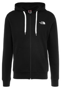 Zwarte rits-hoodie van katoen, met een voorkeurszak, witte trekkoorden en een klein logo op de linkerkant van de borst.