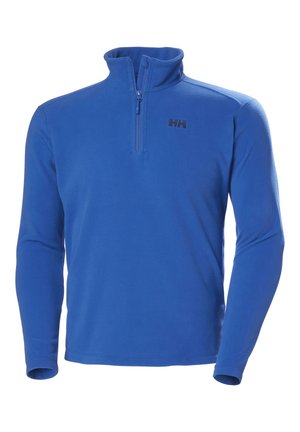 Niebieski polarowy pulower z ćwiartkowym zamkiem, z podwyższonym kołnierzem i małym czarnym logo na piersi. Miękka faktura i długie rękawy.