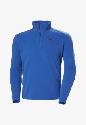 Niebieski polarowy pulower z ćwiartkowym zamkiem, z podwyższonym kołnierzem i małym czarnym logo na piersi. Miękka faktura i długie rękawy.