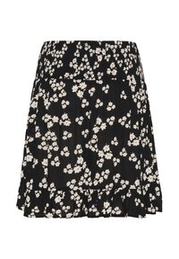 Jupe noire à fleurs avec un ourlet à volants, présentant des fleurs blanches aux centres rouges, conçue avec une taille élastique et un tissu léger.