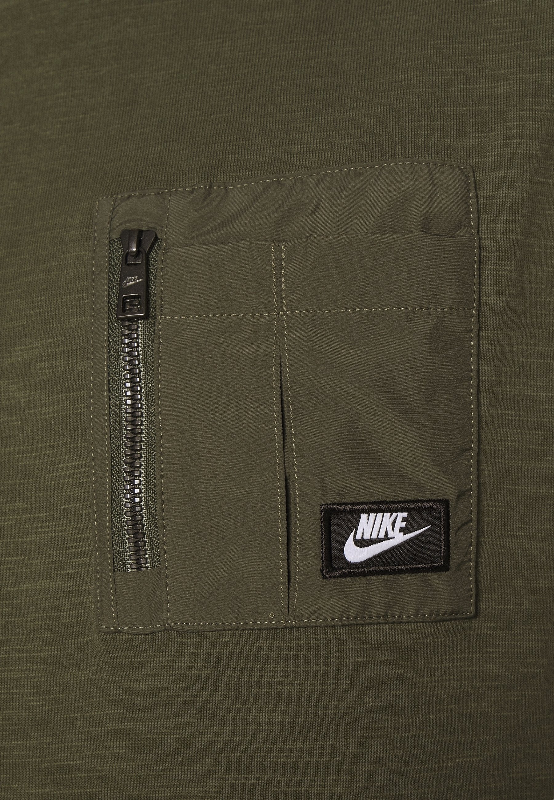 nike t shirt with zip pocket