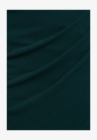 No seleccionado, emerald