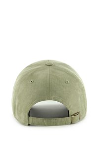 Green suede baseball cap with a round crown, soft texture, adjustable strap at the back, and ventilation eyelets on the sides.
