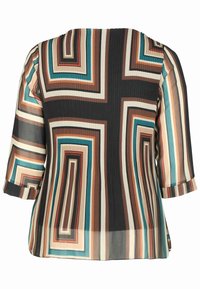 Blouse à manches longues avec motif rayé géométrique en bleu sarcelle, marron, noir et beige, avec un tissu légèrement transparent et des poignets arrondis.