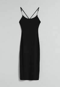 Vestito midi nero a costine con spalline regolabili e dettagli metallici sugli spallacci. Tessuto morbido, silhouette aderente.