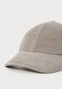 Gray corduroy cap with a rigid brim, featuring vertical ribbed texture and stitched detailing along the brim's edge.