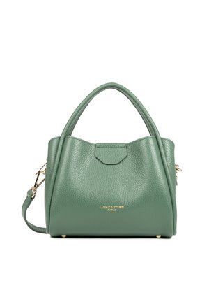 Green textured leather handbag with double handles, detachable shoulder strap, and gold "Lancaster Paris" logo on front.