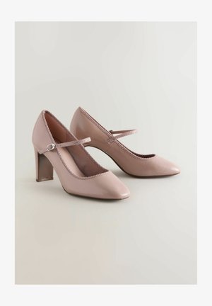 Pink patent leather high-heeled shoes with a pointed toe, lace trim along the edge, and a cross strap feature.
