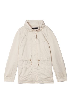 Giacca leggera beige chiaro con colletto alto, vita regolabile con coulisse e due tasche frontali. Presenta una texture liscia e chiusura con zip.