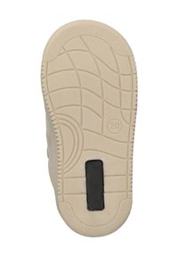 Semelle de chaussure en caoutchouc texturé, de couleur blanc cassé, avec un motif de semelle ondulé et une accent rectangulaire noire au centre.