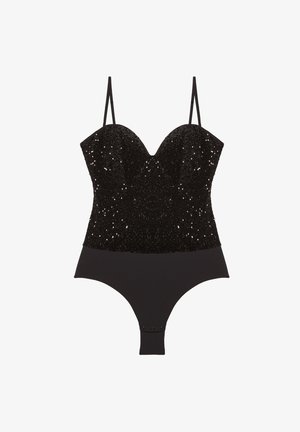 Black bodysuit featuring a sequined, sweetheart neckline top and a smooth, opaque bottom. Adjustable straps and snap closure detail at the base.