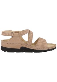Beige leather sandal with woven texture, open design, adjustable ankle strap, and black rubber sole. Features stitching details.