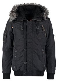 Giubbotto nero con cappuccio foderato in pelliccia, numerose tasche con zip e bottoni, polsini a coste e un tessuto texture. Presenta un design trapuntato.