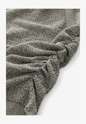 Textured gray fabric with a woven pattern, featuring subtle dark accents and folds creating depth and dimension.