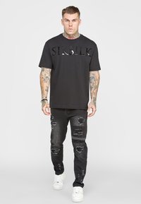 SIKSILK PATCH WORK DISTRESSED - Calças de ganga justas - washed black
