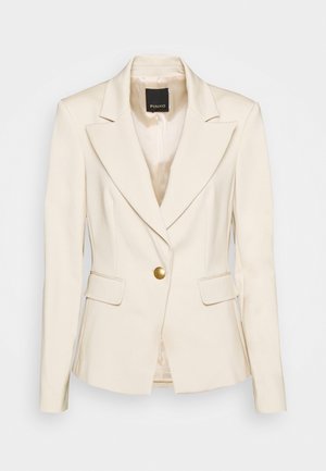 Kremowa, dopasowana marynarka z długimi rękawami, klapami z wycięciem, dwoma przednimi kieszeniami z patkami oraz pojedynczym złotym guzikiem zapięcia.