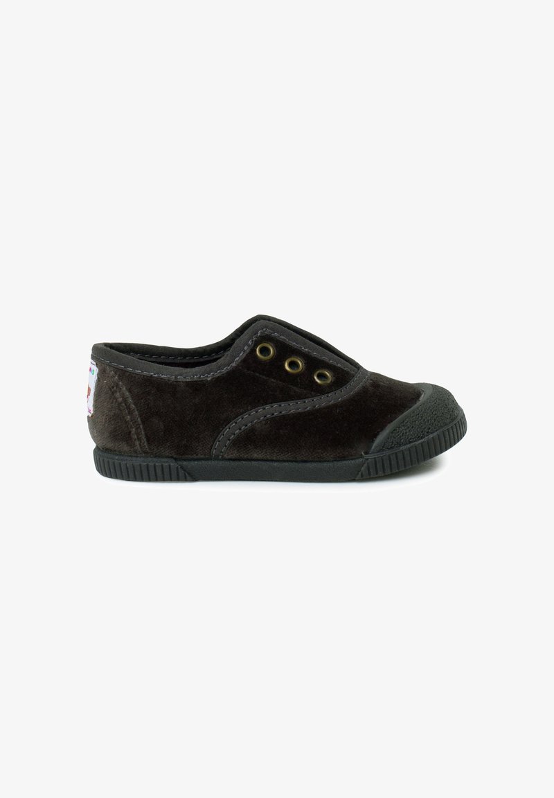 Black velvet sneaker with a low-cut design, round toe, rubber sole, two eyelets, and contrast stitching near the edges.