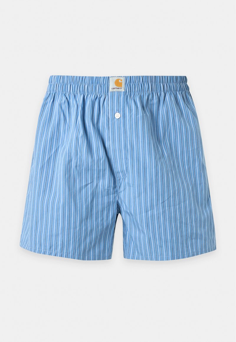 Hellblaue Boxershorts mit vertikalen weißen Streifen, elastischem Bund, Knopfleiste und einem Carhartt-Logo-Patch in der Mitte vorne.