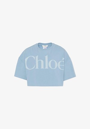 Jasnoniebieska krótka koszulka wykonana z bawełny, z dużym białym logo "Chloé" na przodzie. Krótkie rękawy i okrągły dekolt.