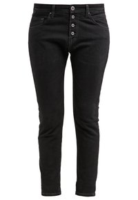 Svarta skinny jeans i denim med femknapps gylf, framfickor och subtila blekningar. Materialet är mjukt med en liten stretch för komfort.