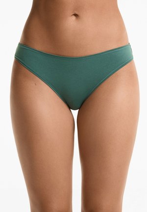 Bas de bikini en coton vert avec une taille basse et une texture lisse. Présente des coutures minimalistes et une coupe simple et classique.