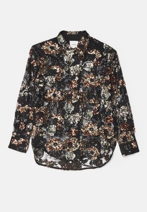 Chemisier noir transparent orné de paillettes multicolores avec des motifs floraux ; il présente un col pointu et une fermeture à boutons sur le devant.