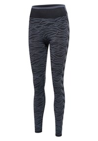 Svarta leggings med ett texturerat zebramönster och ett brett, mörkt midjeband. Sidostrecken har en chevron-design i en kontrasterande grå nyans.